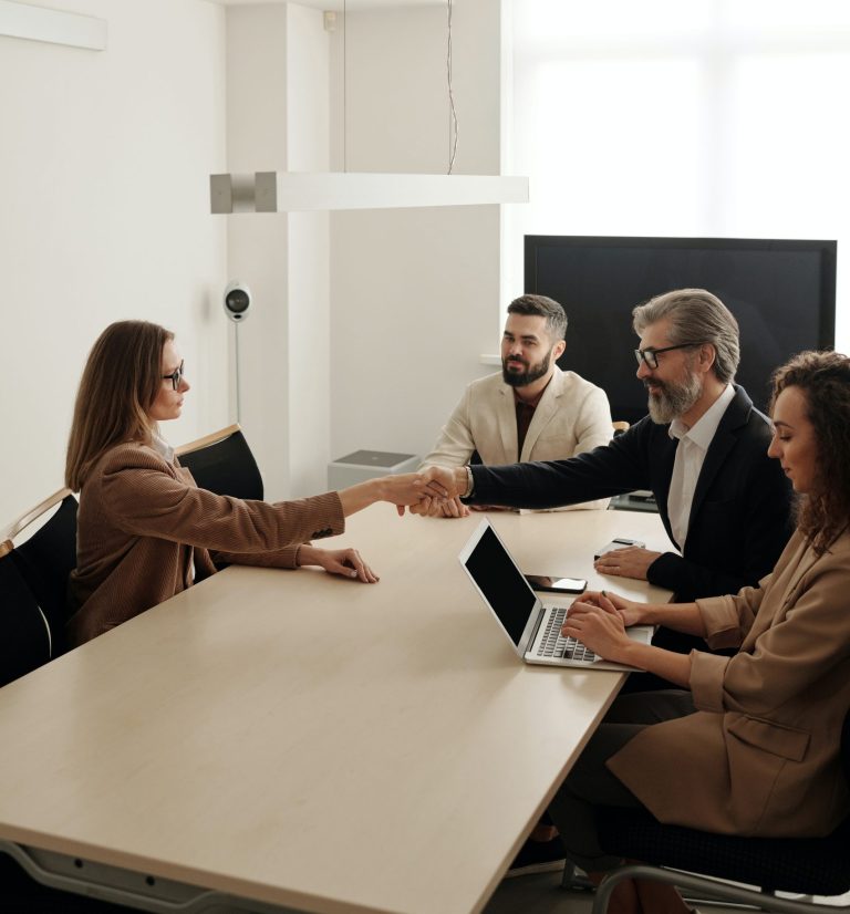 Couple shake hands after agreeing alternative to divorce