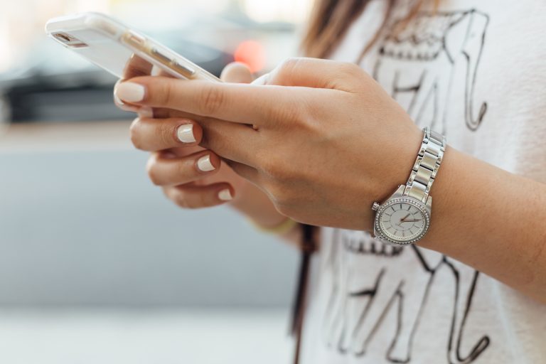 Scullion Law client Paying Fee on her phone