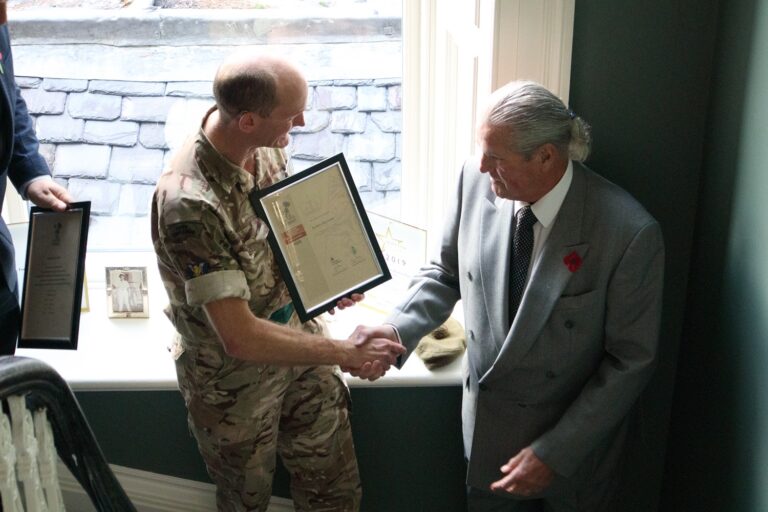 Lt Col Hugo Clark awarding Covenant to Mr Nicholas J Scullion