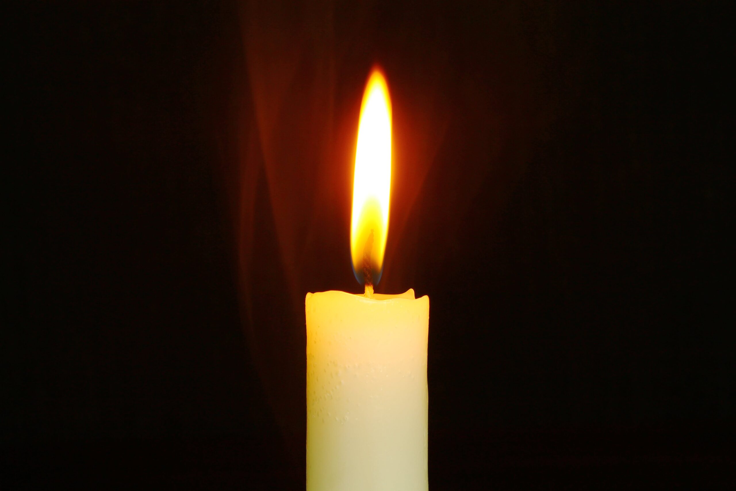 Candle in a dark room
