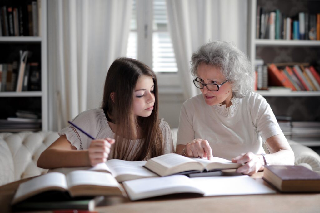 Grandmom Enjoys time Studying with granddaughter