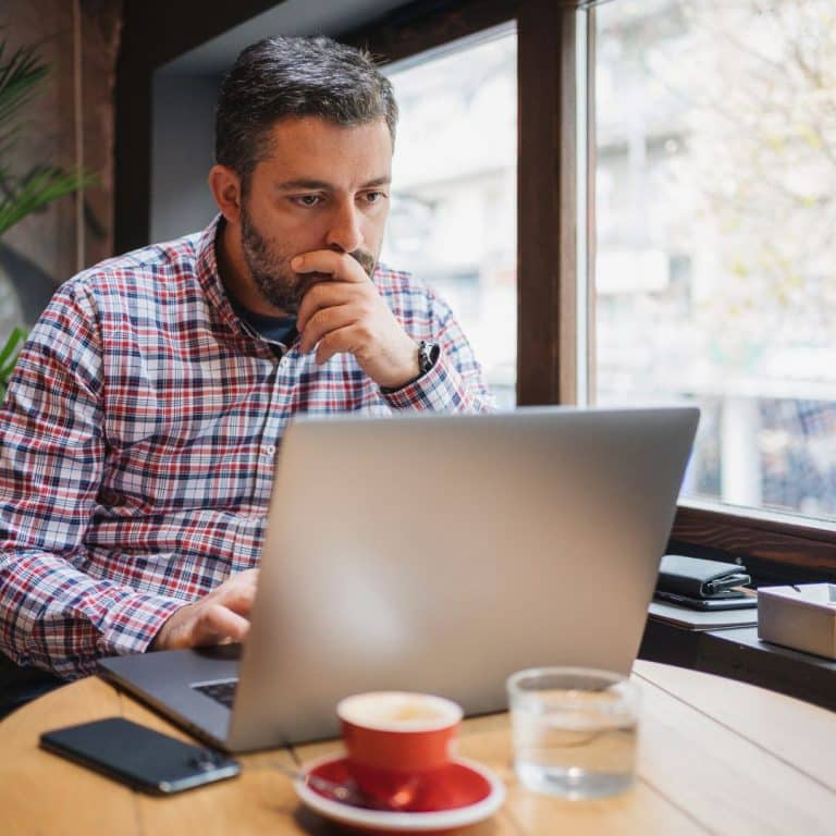 man working at laptop