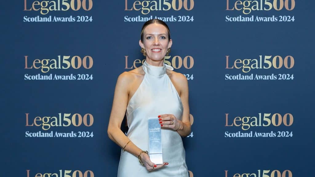 Scullion LAW Criminal Defence Lawyer Anna MacKay accepts the Rising Star of the Year Award at the Legal 500 Awards 2024.