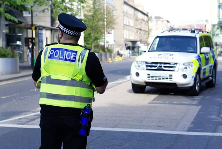 Police Scotland executing a warrant on a suspect charged with firearms offences and organised crime. Scullion LAW top rated in Scotland for criminal defence of serious and organised crime.