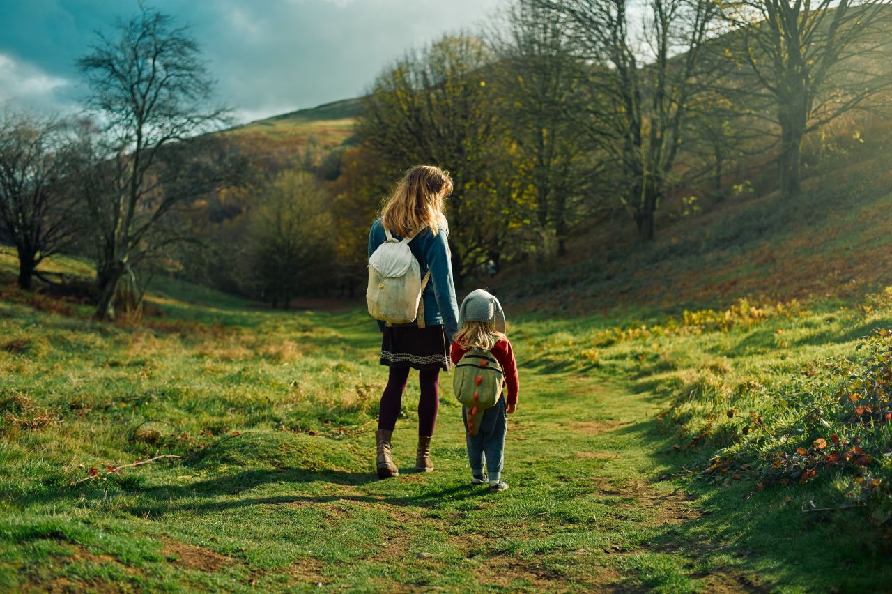 A mother and child walking in Scotland after having a collaboration agreement put in place by the Family Law team at Scullion LAW. Edinburgh and Glasgow's top rated Family Lawyers.