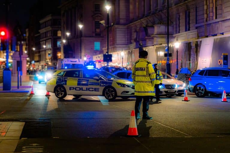 Police Scotland blocking the road while they arrest suspects of possession with intent to supply.