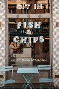 window displaying 'fish & chips' written on it